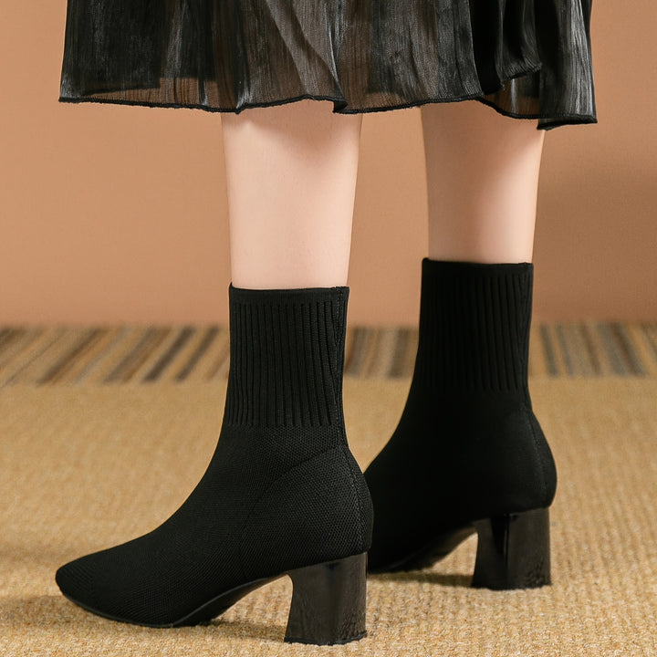 Damen Stiefeletten mit Strickschaft und Blockabsatz in Schwarz
