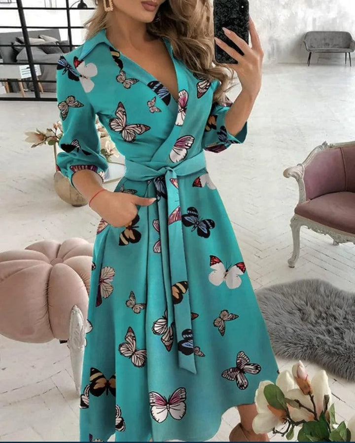 Schickes Midi-Kleid mit Gürtel en Schmetterlingsdruck