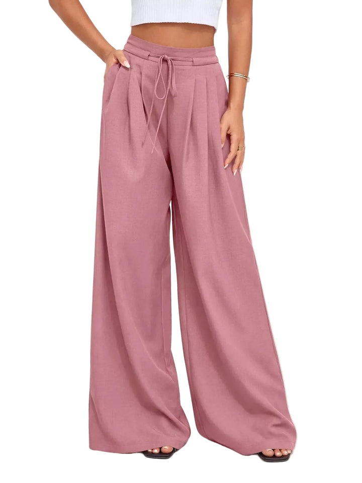 Schwarze Damenhose mit hohem Bund und Faltendetails in Rosa